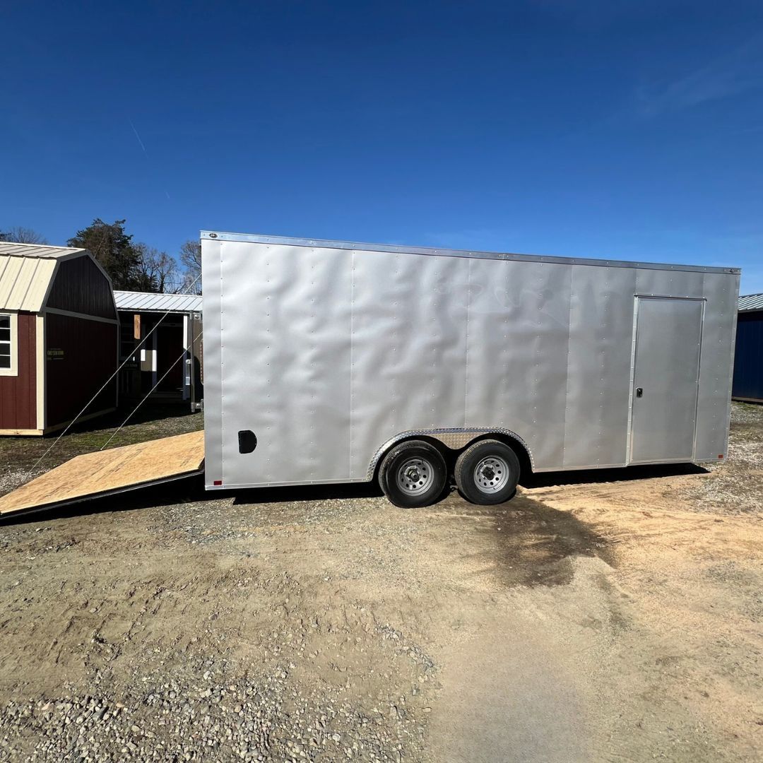 silver trailer outside with open door