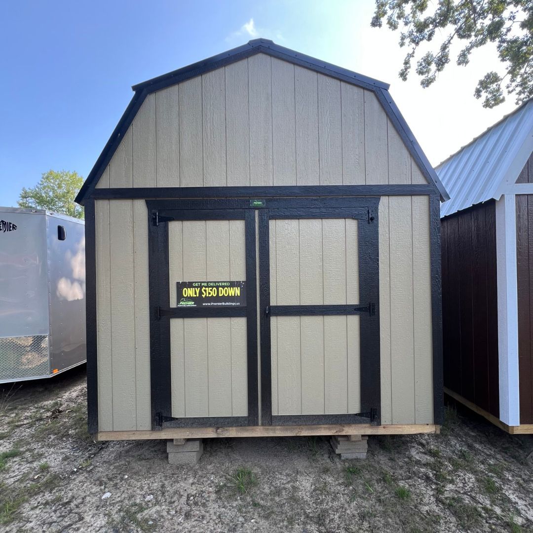 the front of a lofted barn