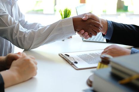 two business men shaking hands