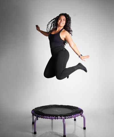 Women jumping on trampoline