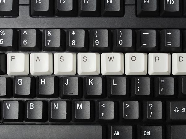 Password spelled in white keys on a black keyboard