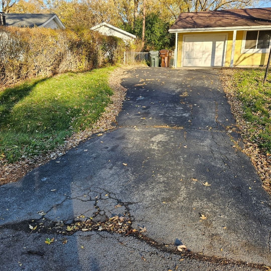 Cracking asphalt driveway