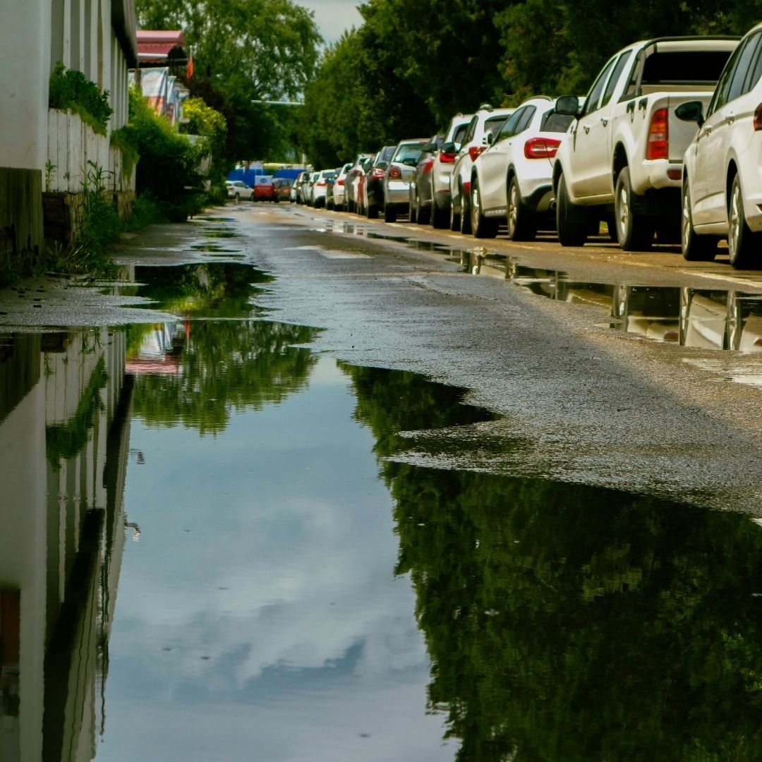 Water accumulating near cars parked
