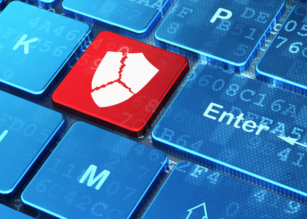 An image of a red key with a broken shield on a keyboard.