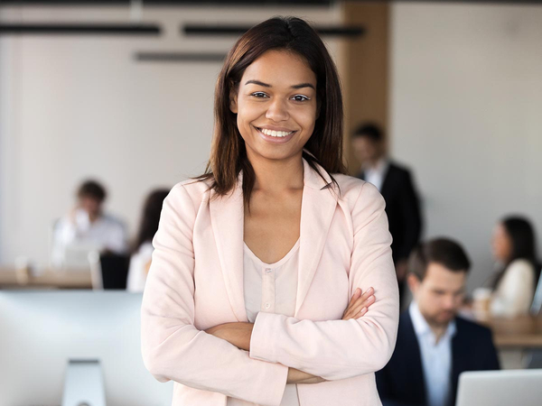 Smiling business woman in office Smiling business woman in office