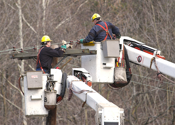 linemen working on electrical