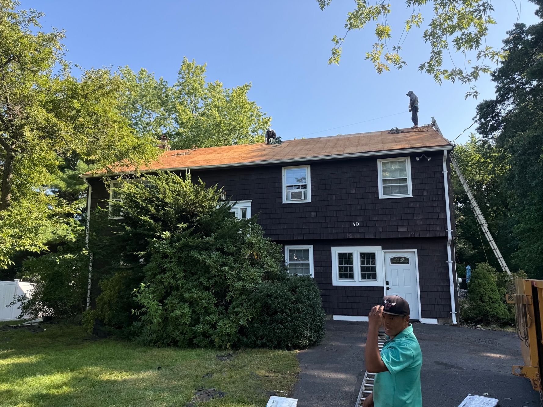 Natarelli & Son Roofing and Gutters roof replacement in progress on a residential home at 40 Brookfield Circle in Framingham, MA.