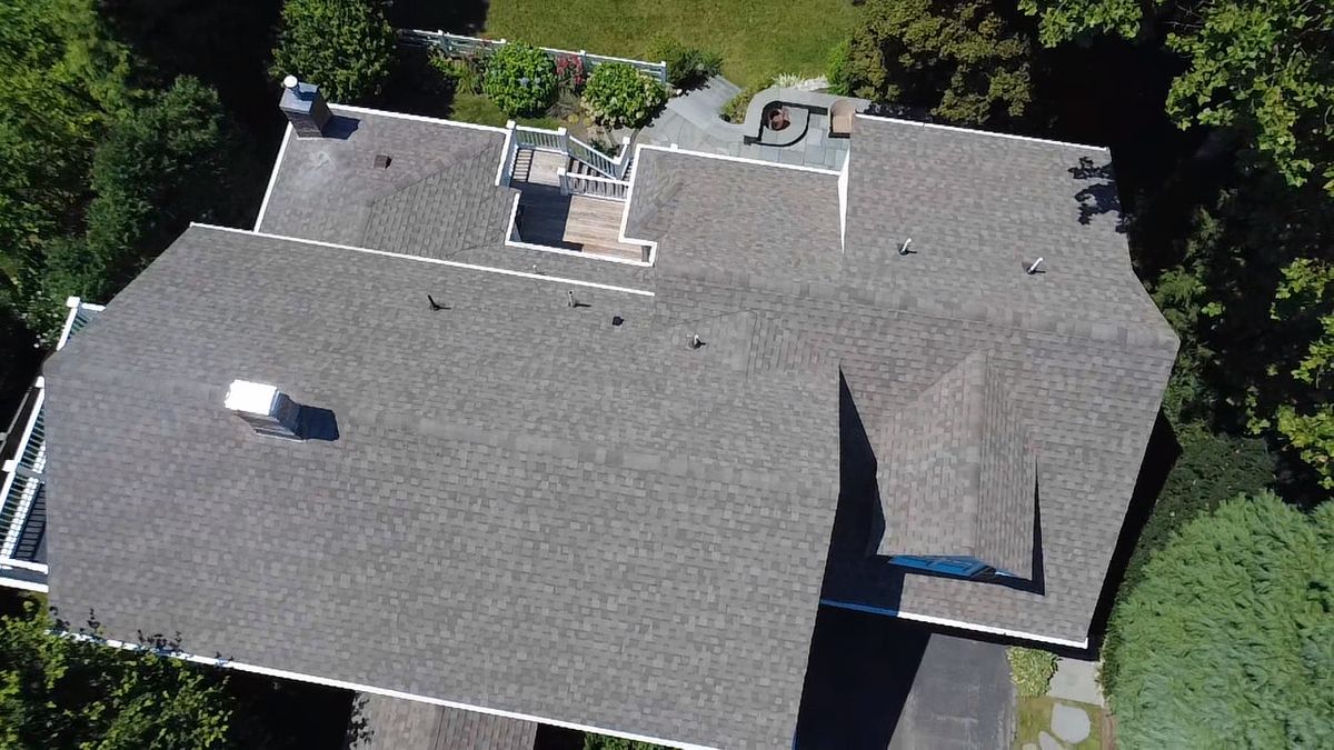 Drone aerial view of Architectural Roof Replacement on large home in Natick MA