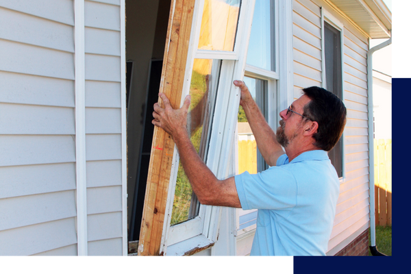 contractor installing windows 