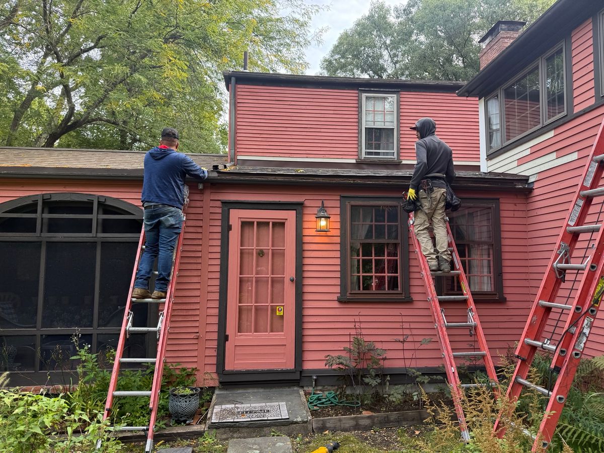 New brown aluminum seamless gutters in Wayland MA