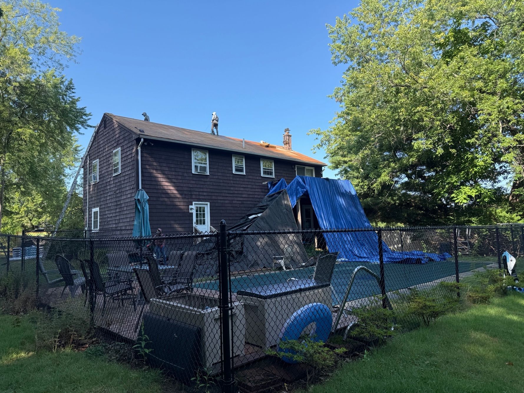 Natarelli & Son Roofing and Gutters roof replacement in progress on a residential home at 40 Brookfield Circle in Framingham, MA.