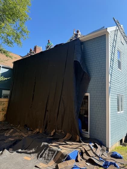 Roof tear-off in Newton MA