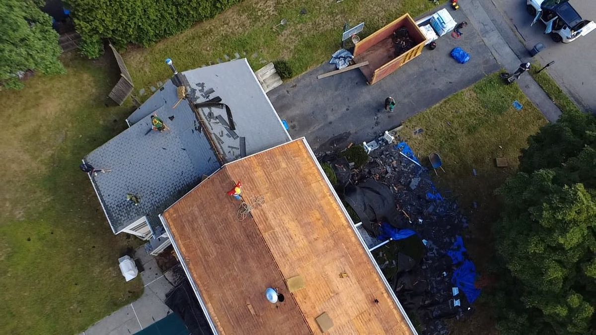 drone view of roof installation decking inspection in natick ma