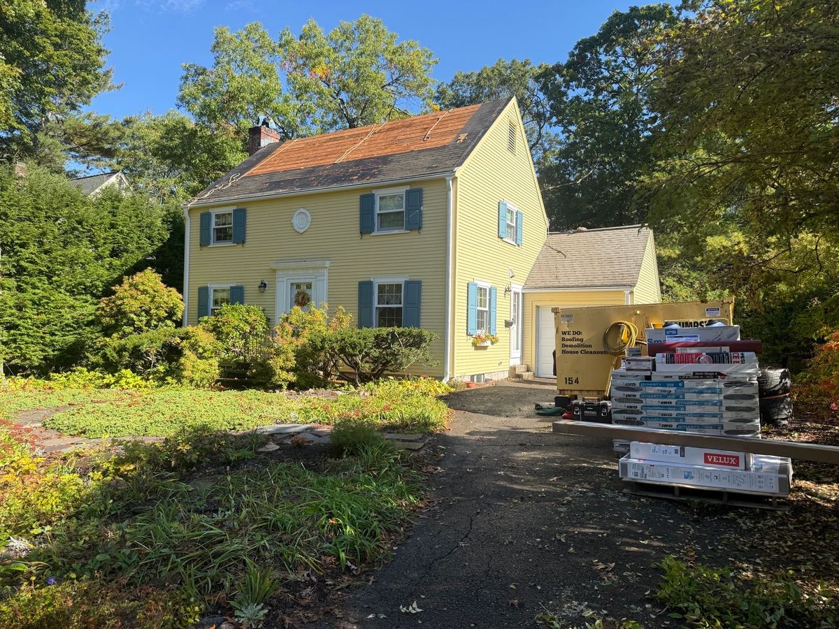 New architectural roof replacement in process in Wellesley MA