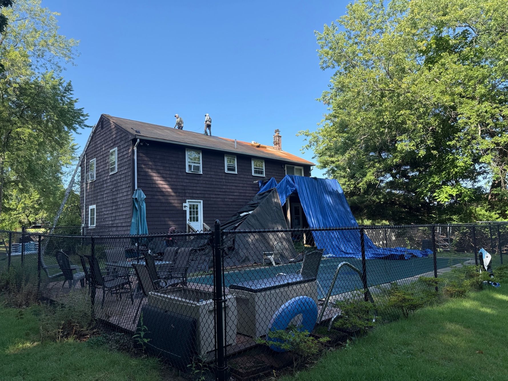Natarelli & Son Roofing and Gutters roof replacement in progress on a residential home at 40 Brookfield Circle in Framingham, MA.