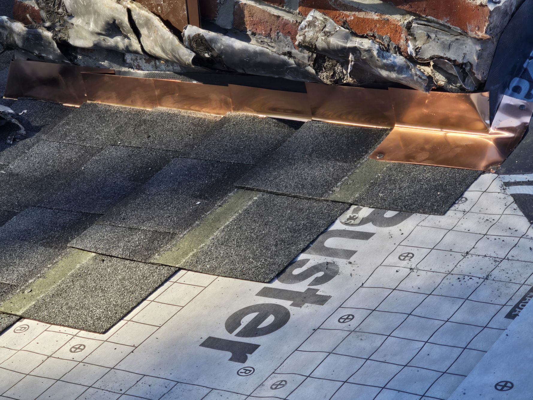 Roof progress, underlayment, ice & water shield on roof install in Norwood MA