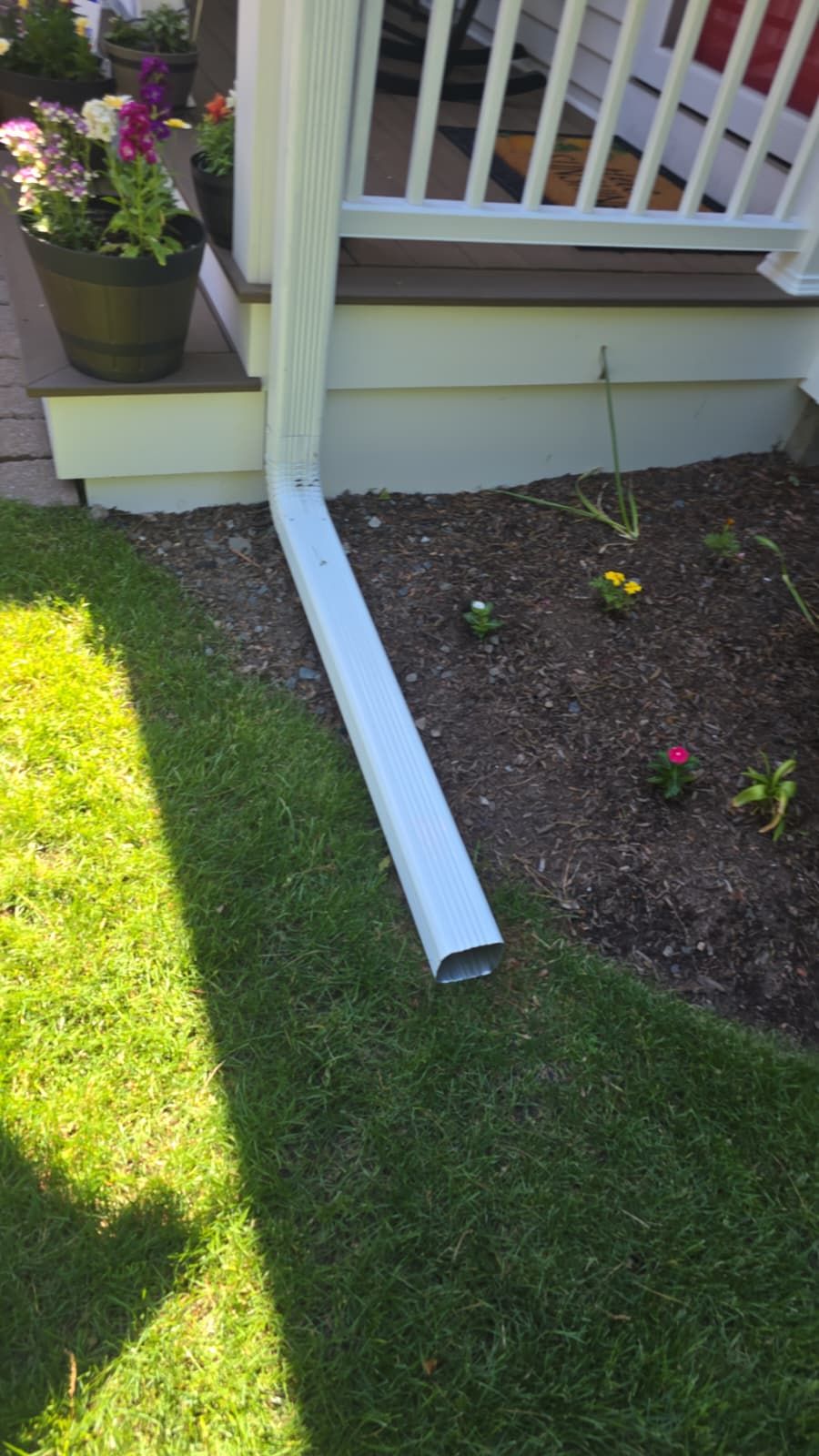 Complete gutter and downspout drainage system on a Natick MA house.