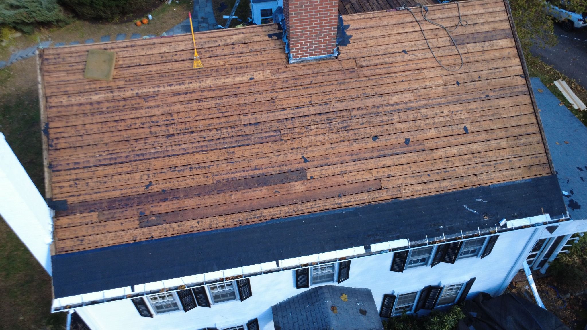 Front view of Exposed roof decking duringhistoric Samuel Dunton House in Norfolk, Massachusetts Front view of Exposed roof decking during historic home roof replacement in Norfolk, MA
