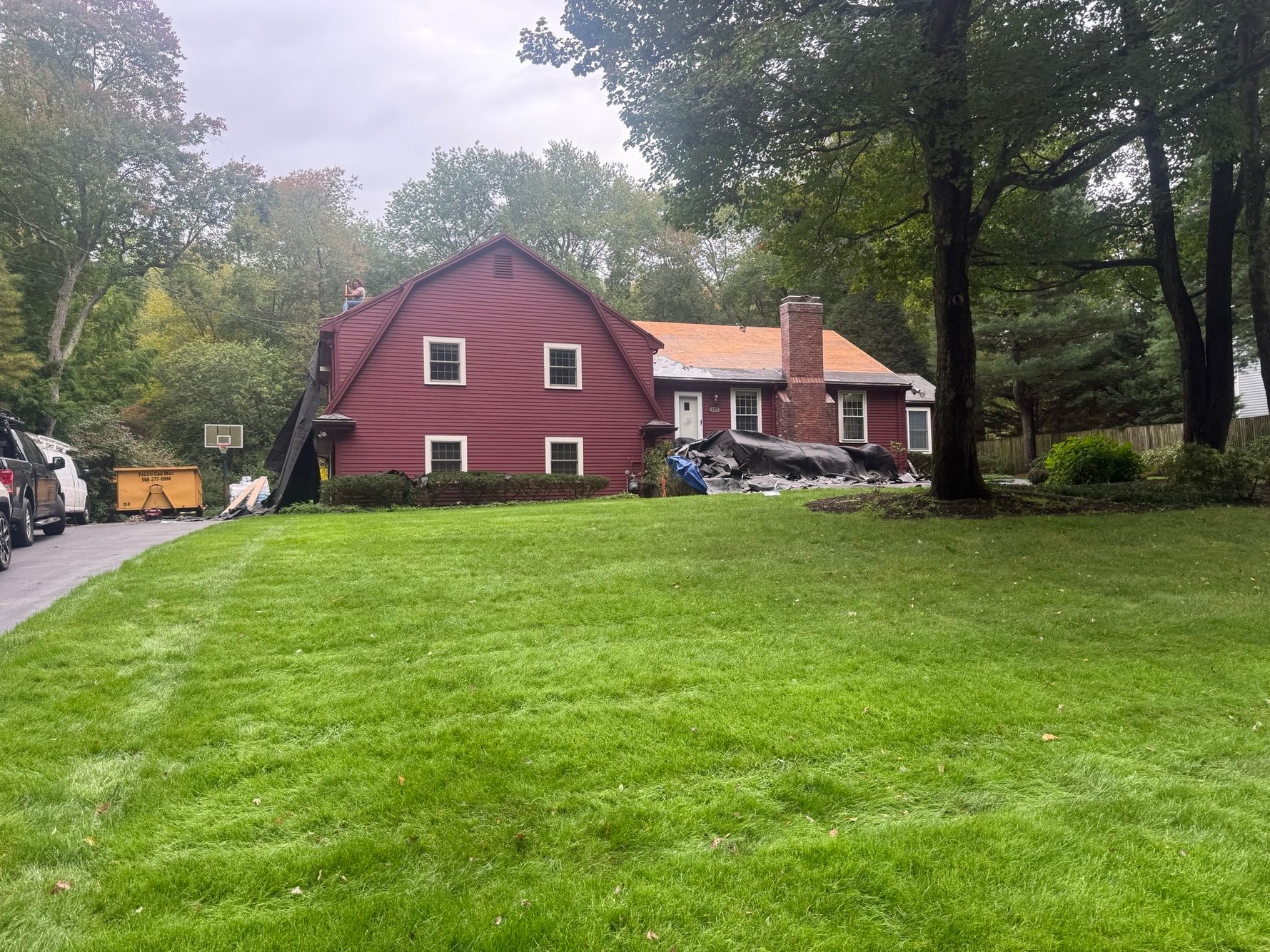 Driveway view of Full Roof installation Needham MA Full Roof installation Needham MA