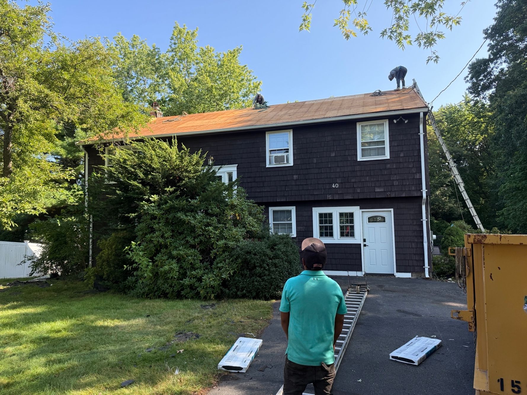 Natarelli & Son Roofing and Gutters roof replacement in progress on a residential home at 40 Brookfield Circle in Framingham, MA.