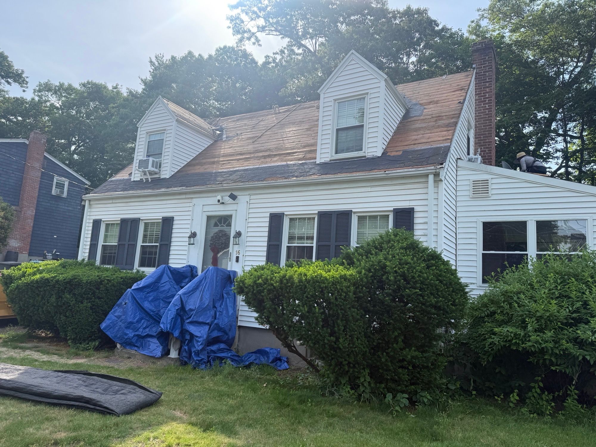 Roof tear-off during re-roof project in Natick MA