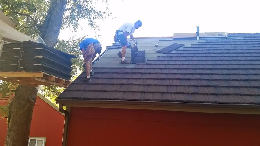 COATED STEEL LIGHT WIEGHT SCREWED DOWN PANELS 100 YR ROOF SYSTEM GIRSCOTTS SAN DIEGO.jpg