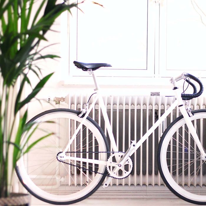 Bicycle in front of radiator panel