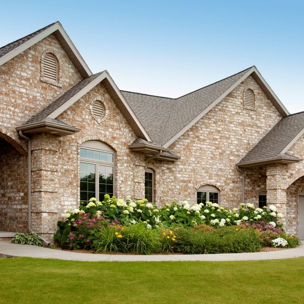 house with flowers out front