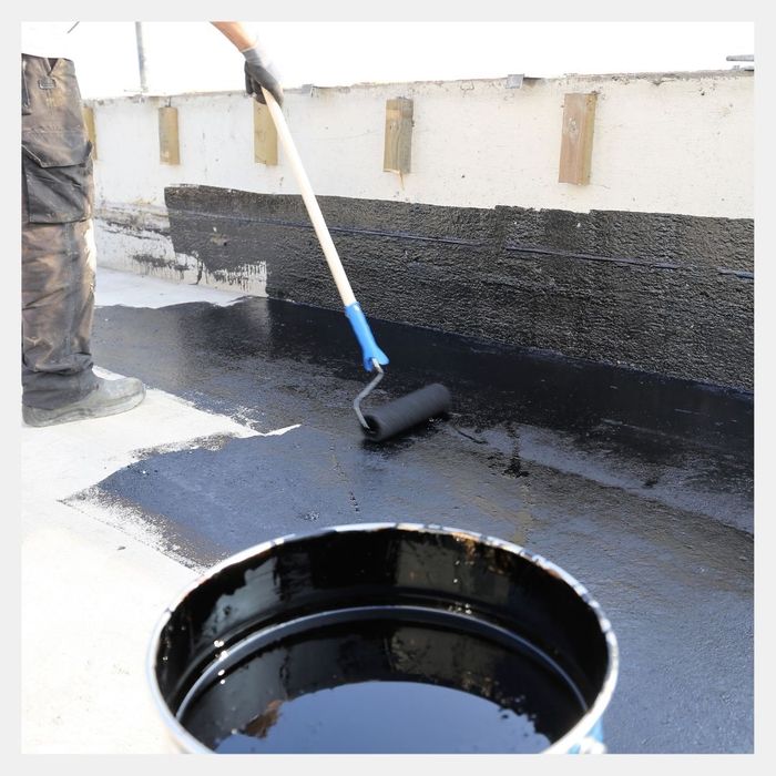 concrete seal being applied