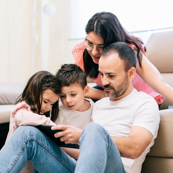 family reviewing fire safety plan