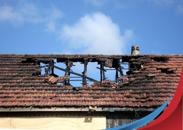 large hole in roof from fire