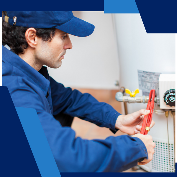 plumber working on water heater installation plumber working on water heater installation