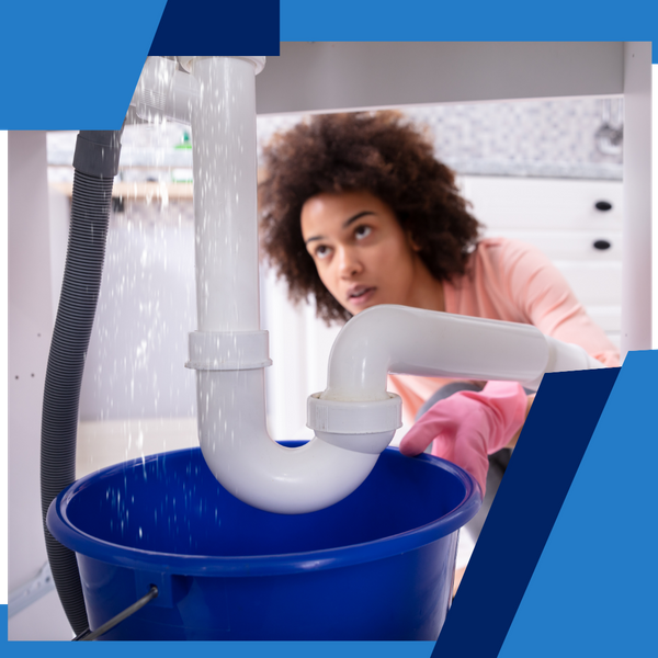 woman who has a plumbing emergency