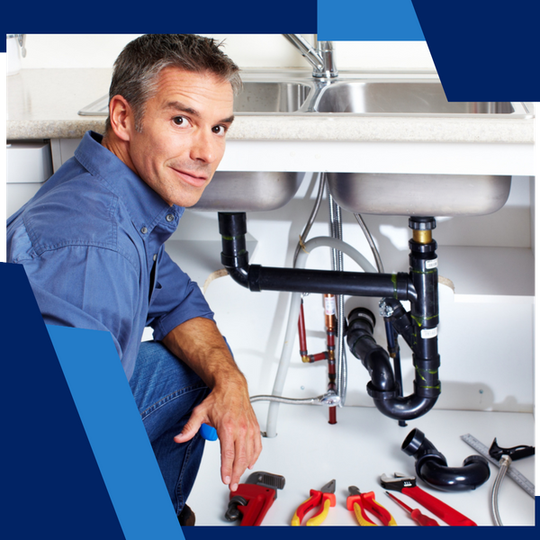 plumber fixing a sink