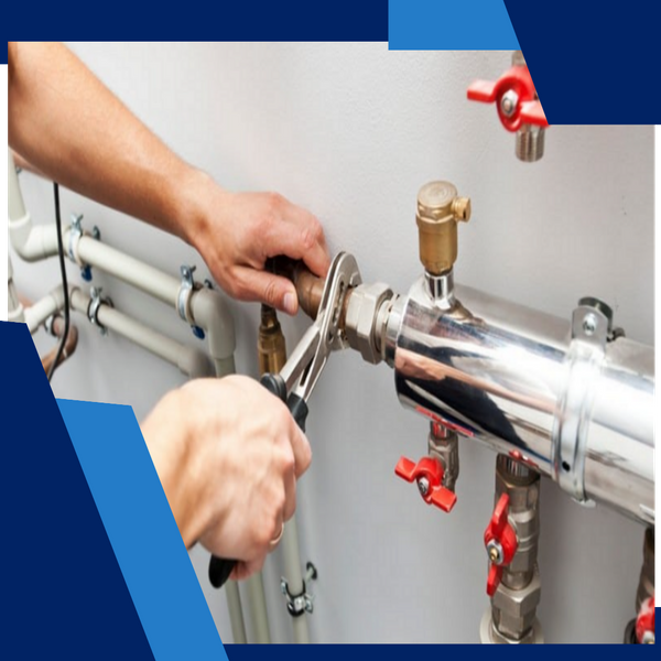 close-up of a plumber working on piping