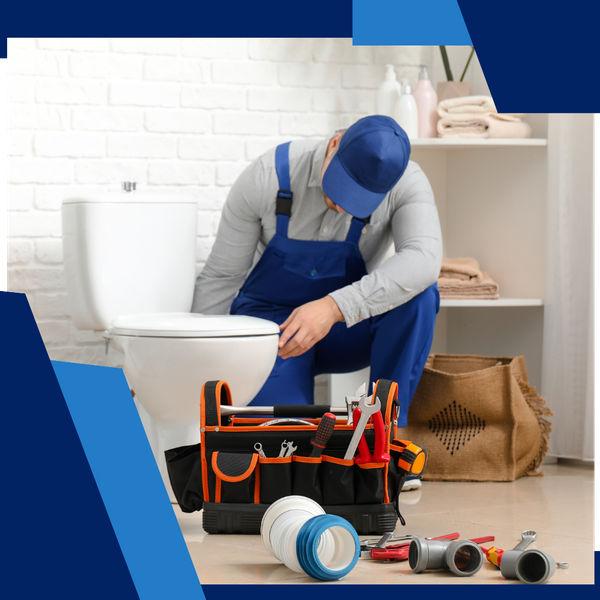 Plumber repairing toilet Plumber repairing toilet