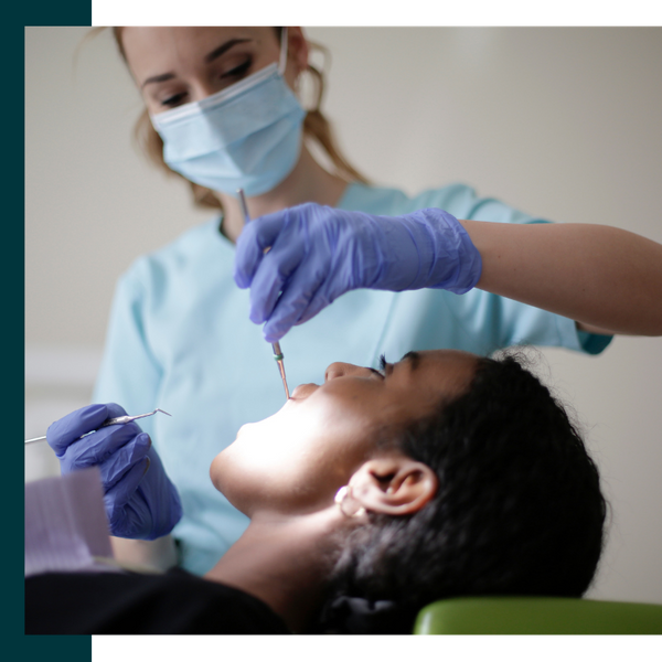 Dentist working with a patient