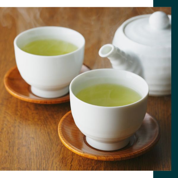 green tea in two tea cups