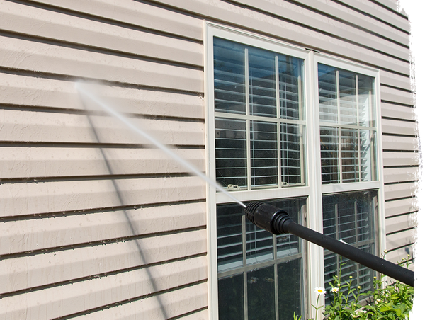 Image of a house being pressure washed