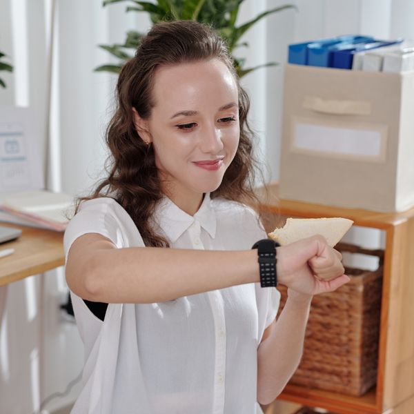 Woman checking her smart watch