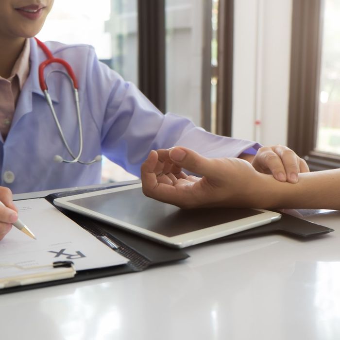 Doctor measuring a heart beat