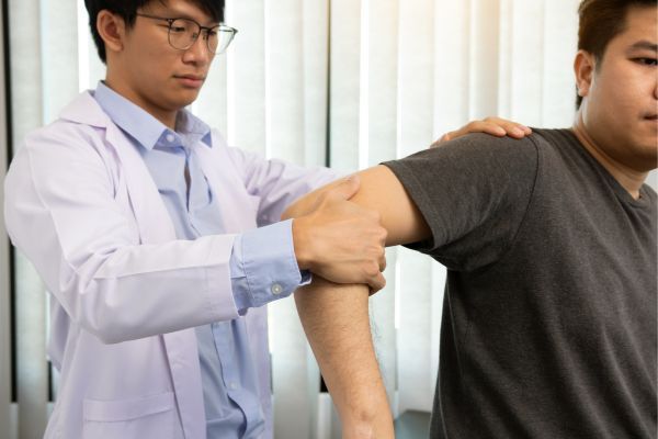 man receiving physical exam