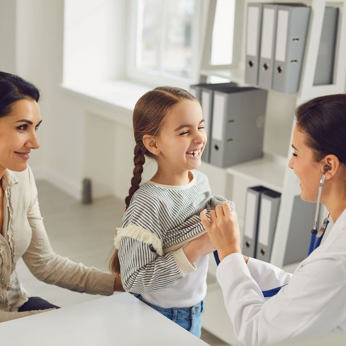 Young girl with doctor