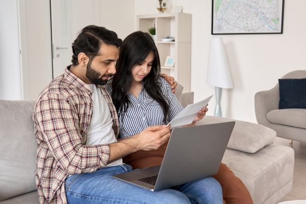 couple looking at medical bill