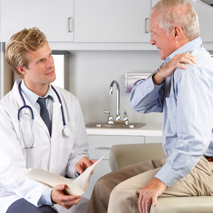 Doctor speaking to patient about their shoulder