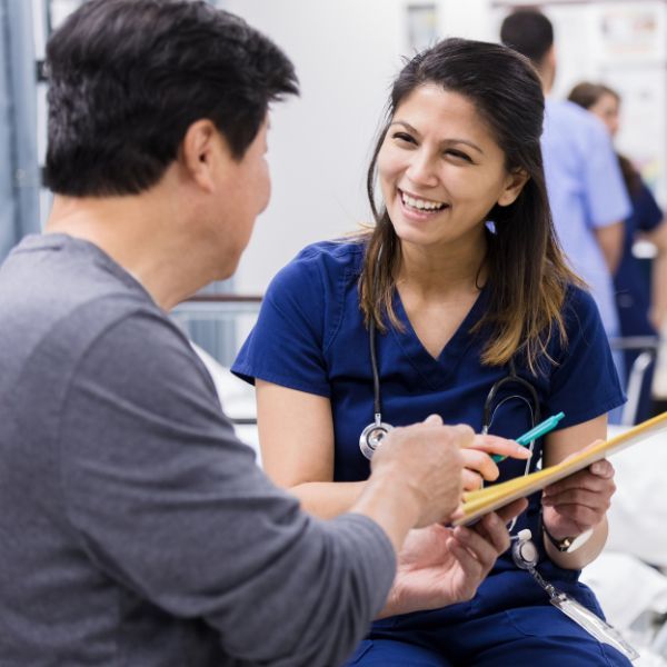 Patient speaking to nurse