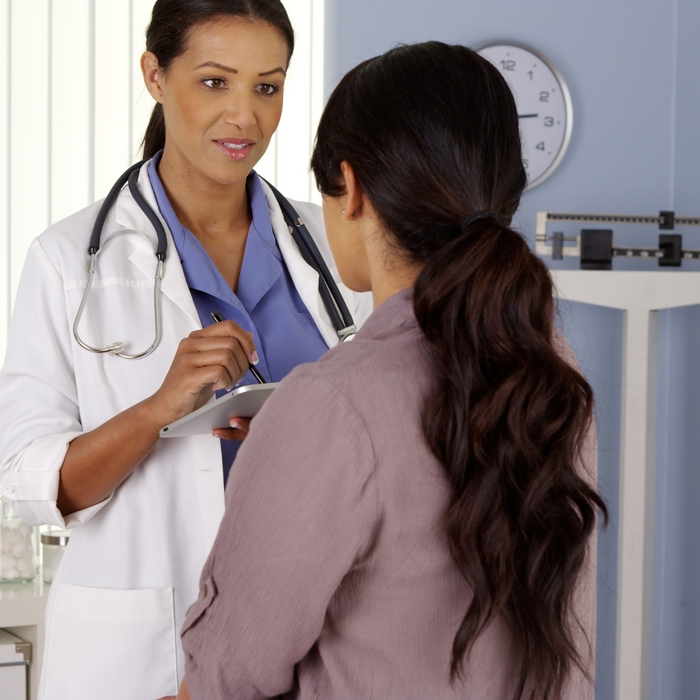 Doctor speaking to patient