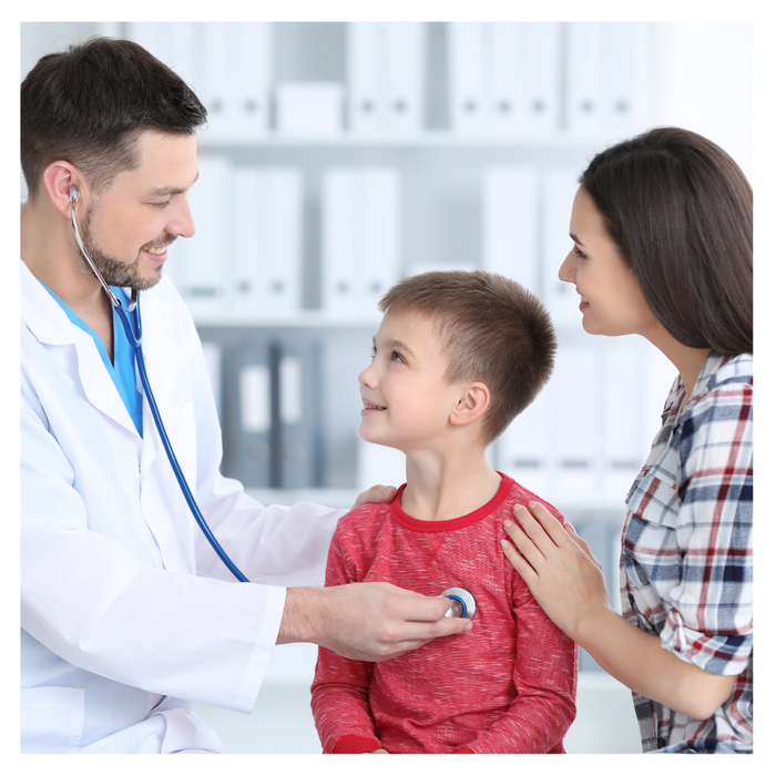 A child and his mom speaking to a doctor