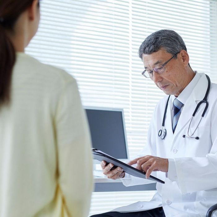 Doctor speaking with a patient