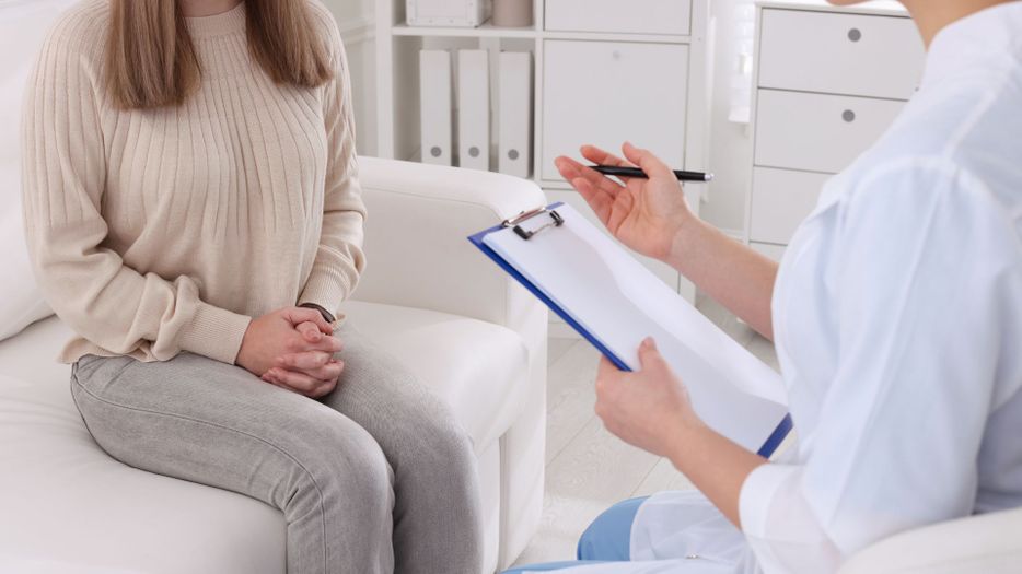 A doctor speaking with their patient 